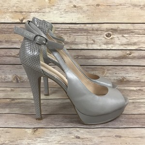 snakeskin pumps nine west