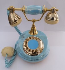 Telefono vintage a rotella, anni 70/80, disponibile in più varienti di colore.