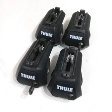 Thule Evo Raised Rail Feet 710405 - Package of 4 with installed locks and keys