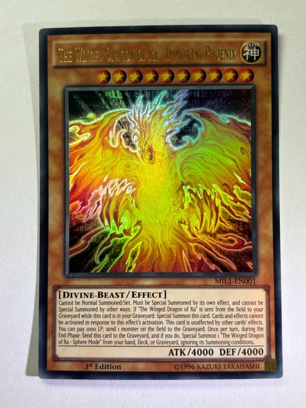 The Winged Dragon of Ra Immortal Phoenix MIL1-EN001 Ultra Rare 1st Ed Card NM