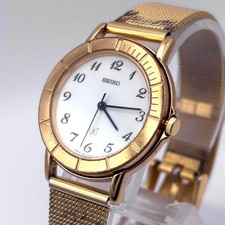 Seiko Quartz Womens Dress Watch 1F21 0K90 Gold New 27.8mm wrist 19cm