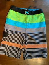 cherokee boys swim trunks XL black, blue, and green, pocket in front