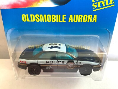 Hot Wheels OLDSMOBILE AURORA Police Car - Blue & White Card