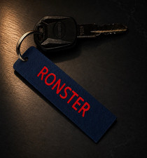Blue Solid Key Chain with Red RONSTER Letteri...