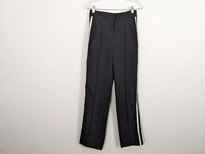 Current Air black pants with white and green stripe on side