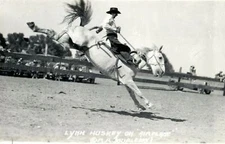 Lynn Huskey on Airplane R.R. Doublepay Rodeo RPPC Photo Postcard 