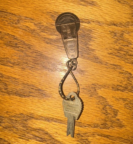 Vintage Brass Duncan Parking Meter Keychain with key.