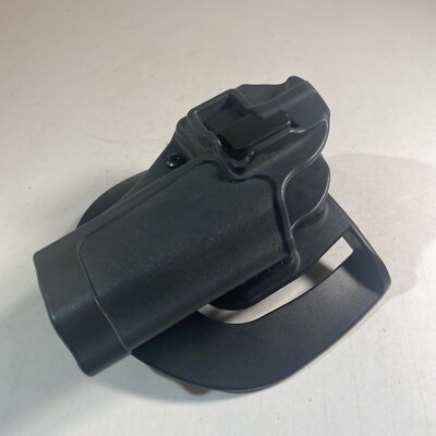 Blackhawk CQC Holster with Blackhawk C1352 Paddle Right Handed