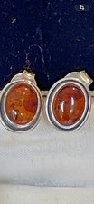 Lovely pair vintage solid sterling silver earrings set with amber