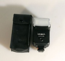 MINOLTA AUTO 128 FLASH W/ CASE AND WIDE ANGLE DIFFUSER 
