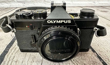 Olympus OM-1 35mm SLR Film Camera Body Only Black tested but please read