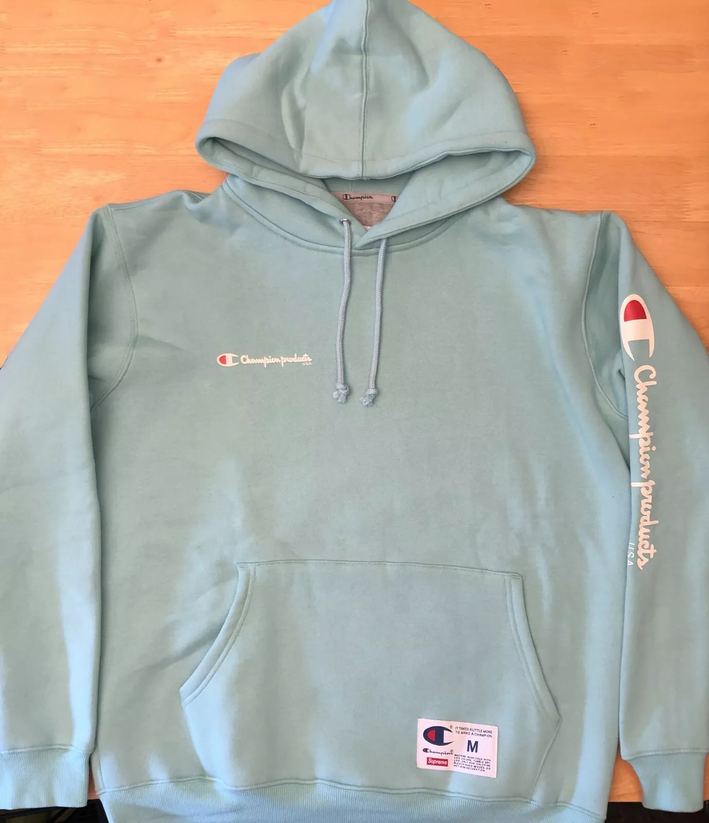 Sweat à capuche logo Champion & Supreme bleu comme neuf taille M moyenne   expédié le jour même