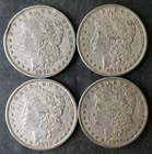 Lot of Four 1879 $1 Morgan Silver Dollars