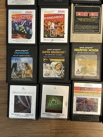 Atari 2600 Woodgrain 4 Switch Console w/ 25 Games 2 joysticks Tested Working