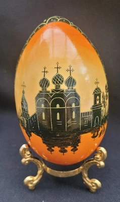 Russian Hand-painted Lacquered Egg with Cathedral Scene on Gold Metal Stand - Image 1 of 4