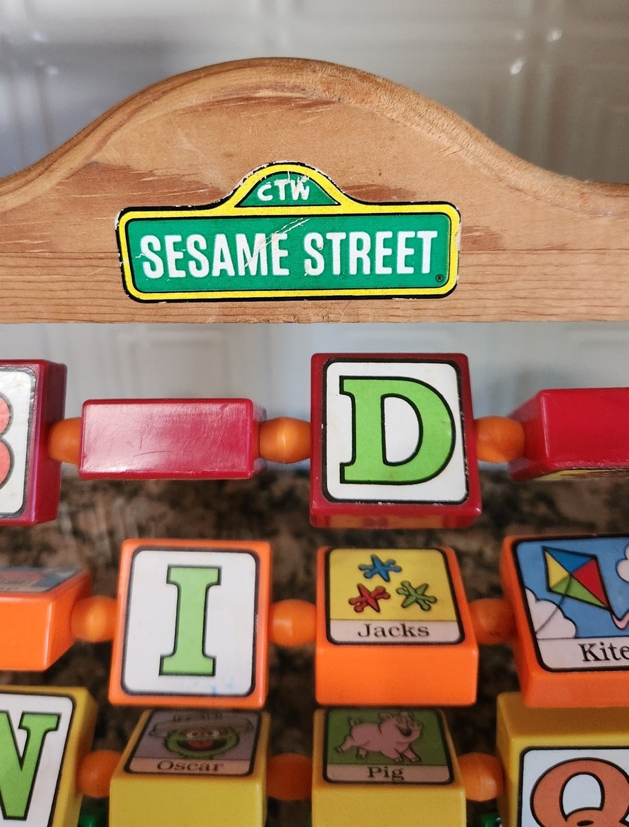 Vtg Sesame Street Wooden Spinning Alphabet Learning Picture Blocks