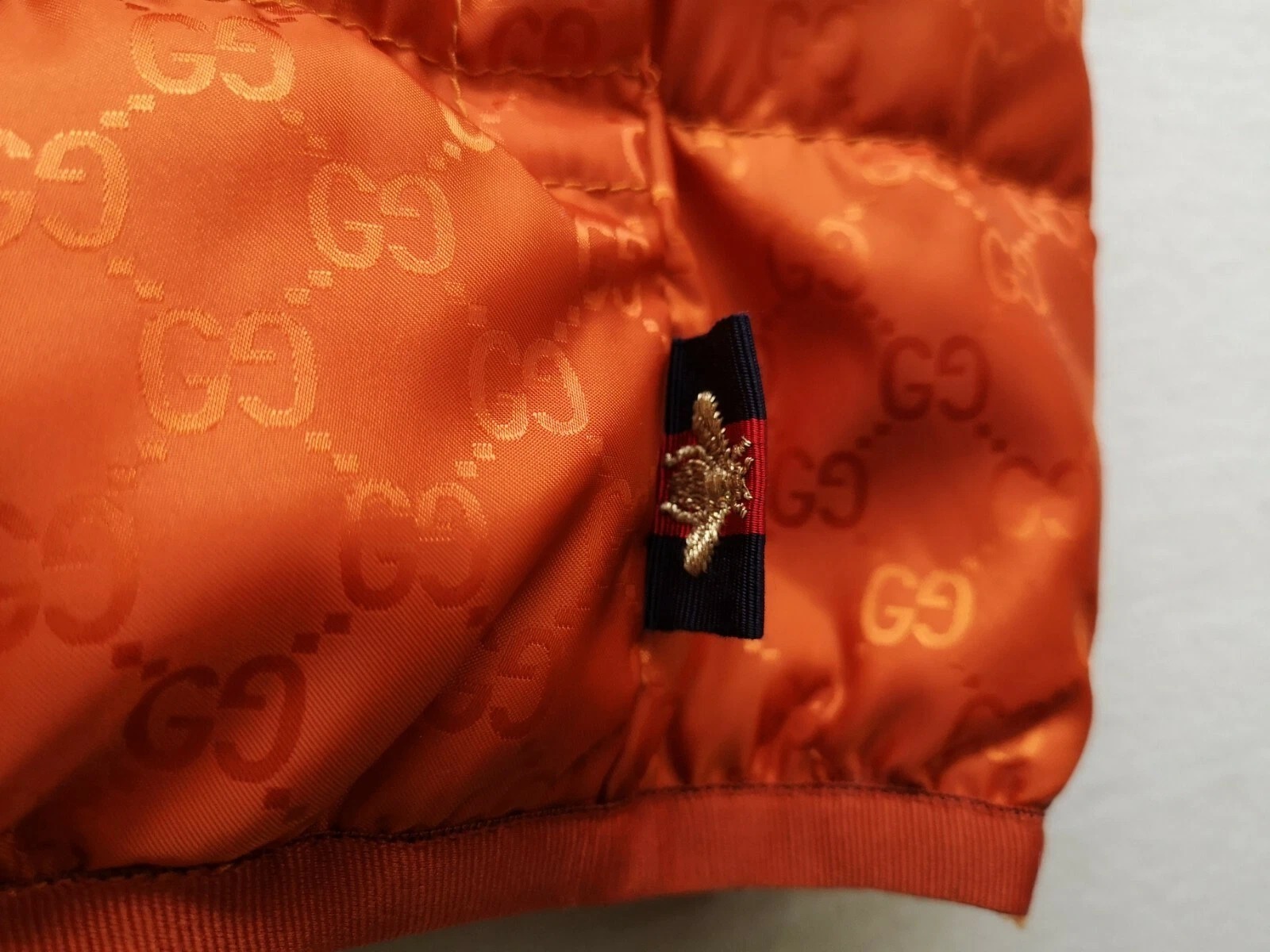 Gilet imbottito GUCCI da uomo arancione modello GG taglia 46 buone condizioni
