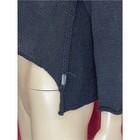 Black asymmetric crop sweater with long sleeves and front pockets, displayed on a white mannequin torso.