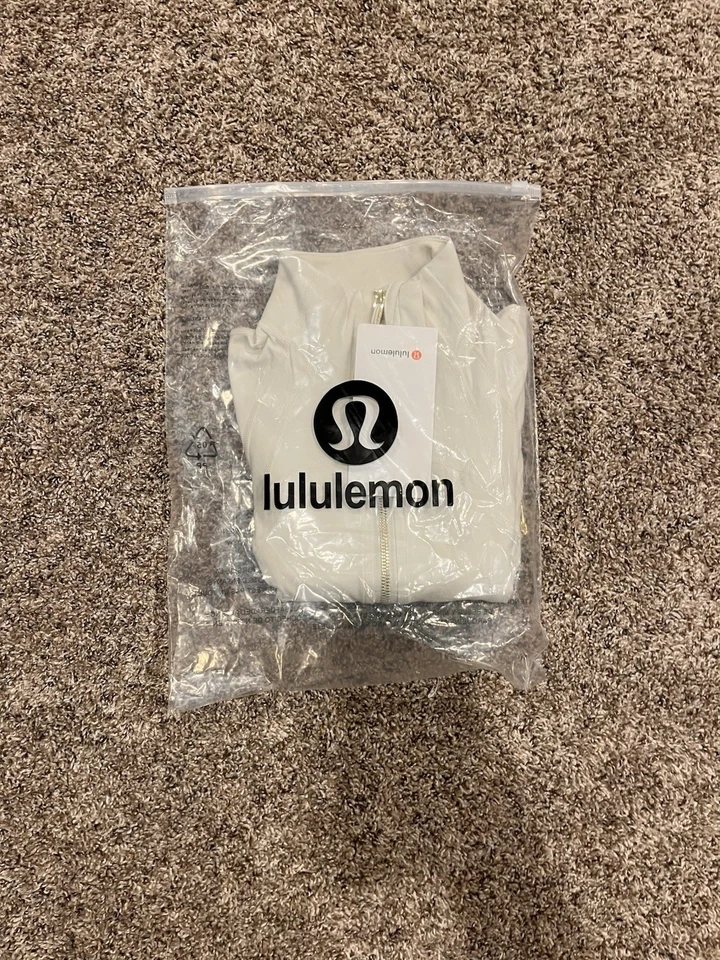 Chaqueta recortada Lululemon Define, blanca para mujer, cremallera dorada talla 4 Foto 4 de 4