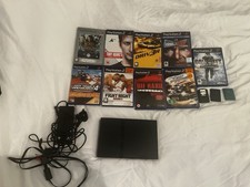 PlayStation 2 Slim Black Bundle With 9 Games And 3 Memory Cards - No Controller