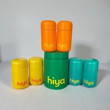 Lot Of 6 Hiya Glass Capsule Pill Bottle Containers Plus Greens Tin ALL EMPTY