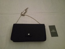 Pochette da cerimonia blu con fiocchetto e pietra con catena argento Carpisa...