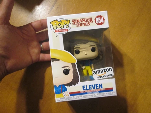 Funko Pop! Television  Stranger Things Eleven (Yellow Outfit) # 854 Amazon READ