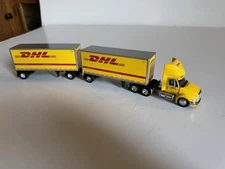 DHL Express Logistics International Prostar Doubles 1/64 Diecast Truck DCP 31753
