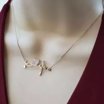 1Ct Round Lab-Created Diamond Women's Heart Beat Pendant 14K Rose Gold Plated