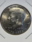 1976-D 50C Clad Kennedy Half Dollar