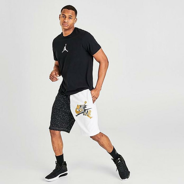 white and gold jordan shorts