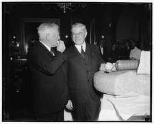 Wisconsin cheese. V.P. Garner & Sen. F. Ryan Duffy of Wisc. tasting cheese,