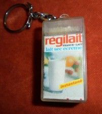Porte-clés Boite lait en poudre REGILAIT France-lait sec écrémé granulés mobiles