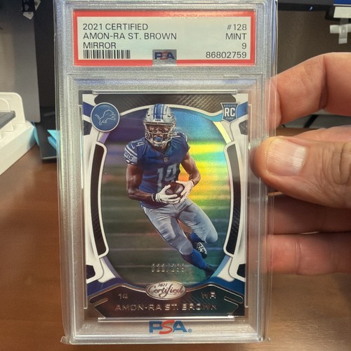 2021 Panini Certified Rookies Amon-Ra St. Brown Mirror /299 #128 PSA 9🔥📈LIONS