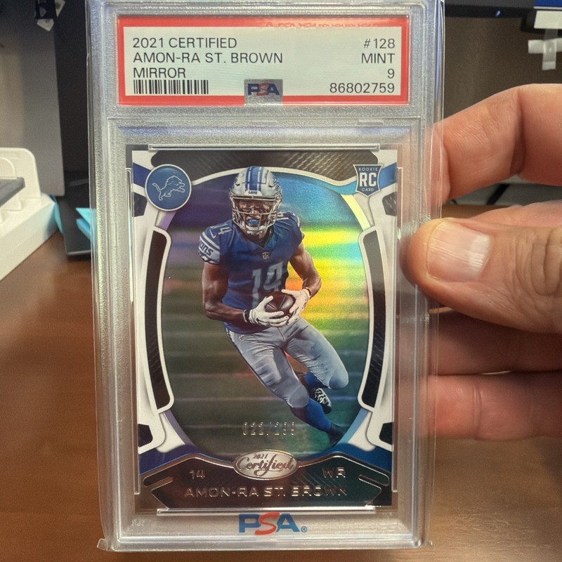 2021 Panini Certified Rookies Amon-Ra St. Brown Mirror /299 #128 PSA 9🔥📈LIONS