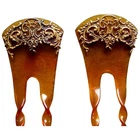 Late Victorian matched pair hair combs with gilded design