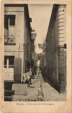 Old postcard Calais - Une rue du Courregain (139793)