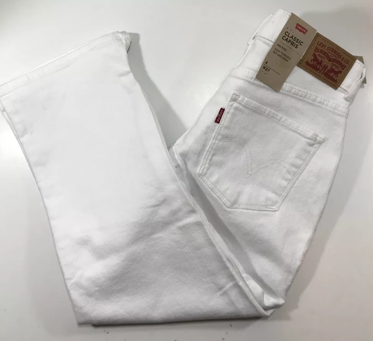 White levi capri jeans sales