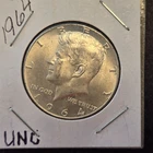 1964 Kennedy silver half dollar.Unc