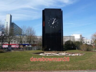 PHOTO  READING: LARGE CLOCK OUTSIDE THE CIVIC CENTRE AND COURTS A LARGE TRIANGUL