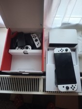 Nintendo Switch OLED Console portable blanche avec Joy-Con et dock
