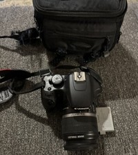 Canon EOS Rebel XS DS126191 Digital Camera with bag, strap and 18-55mm Lens