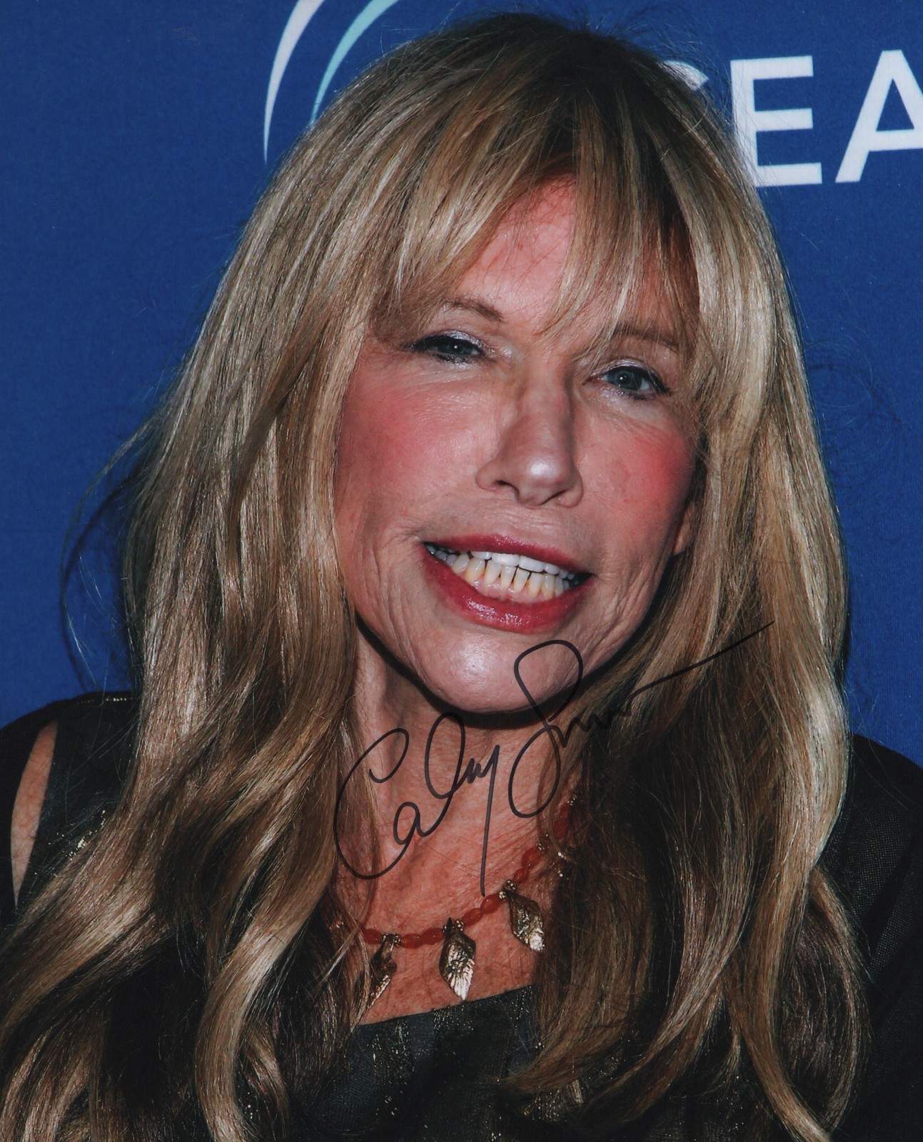 A fantastic 10x8 Autographed Photo of Carly Simon & CoA