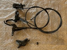 Shimano Deore 4-pot brakes, front/rear