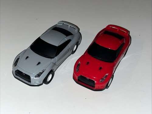 Markenlose Nissan GTR Slot Cars X2 rot grau Arbeitsscheinwerfer 1:43 ? - Bild 2 von 24
