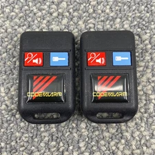 CODE ALARM Key Fob Remote / PCB0182L GOH-TSM-23 / 2 Button Lot of 2 - Tesetd