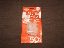 VINTAGE MADE USA 50 MINIATURE CHILD ELECTRICAL OUTLET SAFETY CAPS UNOPENED