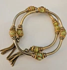 Vintage Miriam Haskell Coil Bracelet Unsigned 1950's Gold Tone Green Beads Tasse
