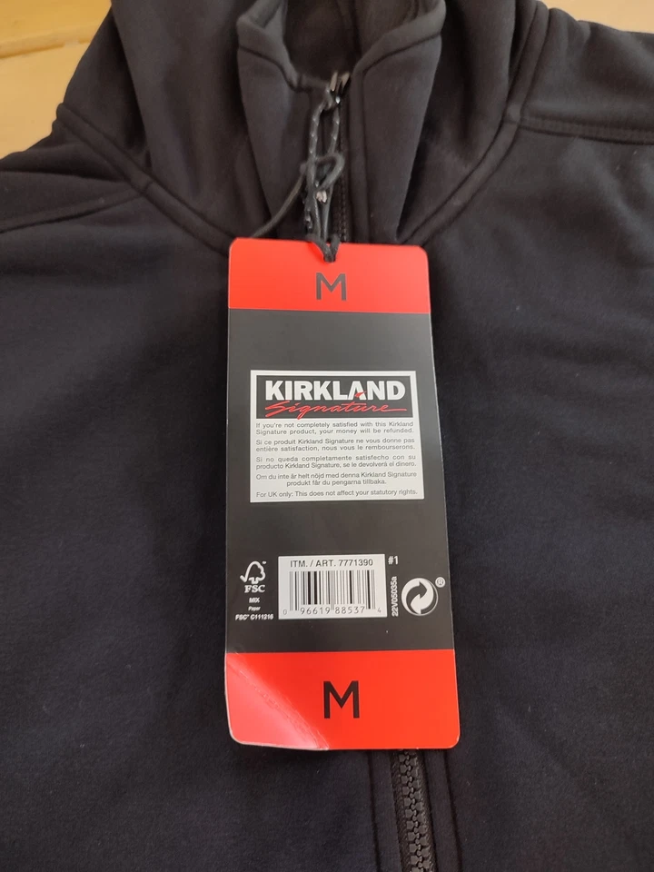 Chaqueta polar transpirable elástica con capucha Kirkland Signature para hombre negra mediana Foto 2 de 4