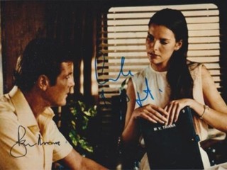 ROGER MOORE ( ) & CAROLE BOUQUET DOUBLE SIGNED 007 JAMES BOND CAST AUTOGRAPH
